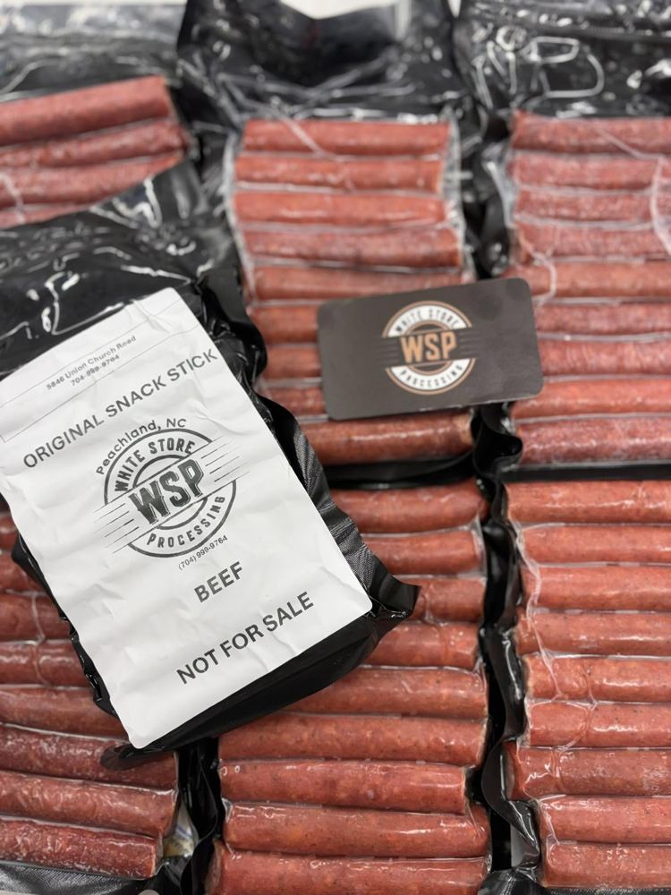 Vacuum-sealed beef snack sticks with a White Store Processing label marked Not For Sale